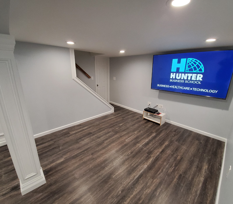 Renovated basement with new flooring in Islip, NY