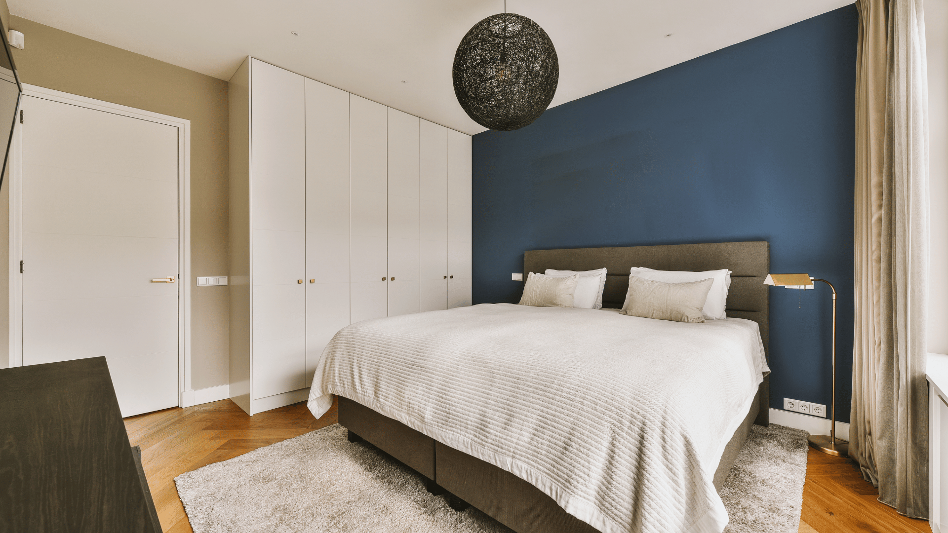 Bedroom with painted accent wall